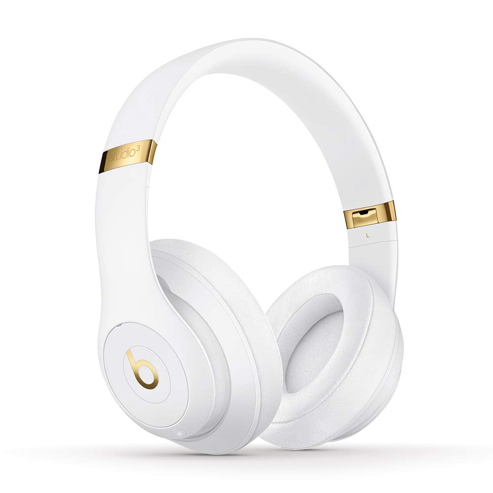 White and gold beats headphones
